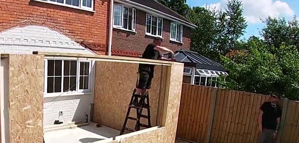 SIP panel home extension walls going up on site